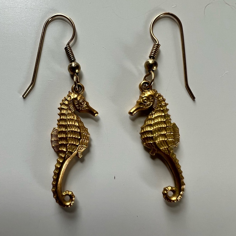 Gold seahorse dangle drop earrings